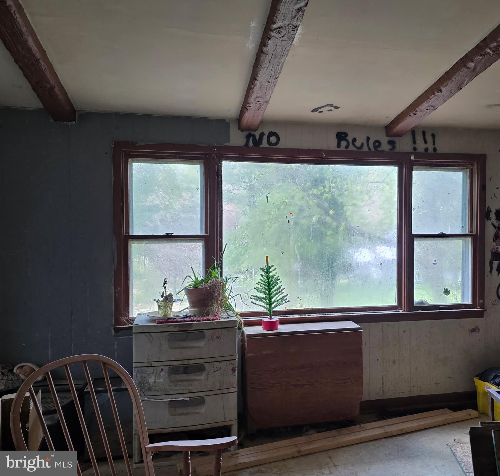 217 Main Street Delta, PA 17314 - Photo 12 of 16 a room with furniture and window