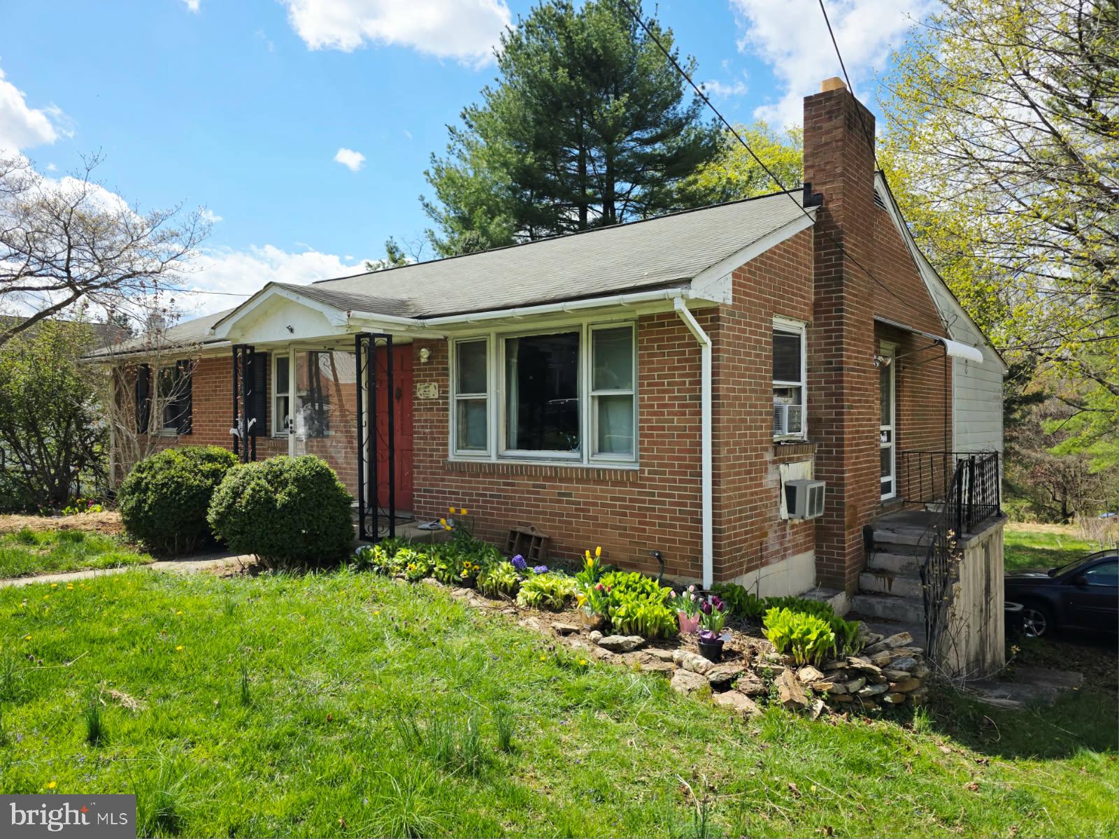 217 Main Street Delta, PA 17314 - Photo 2 of 16 a front view of a house with a yard