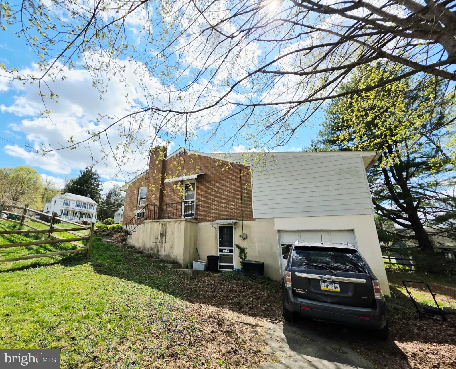 217 Main Street Delta, PA 17314 - Photo 5 of 16 a house view with a garden space