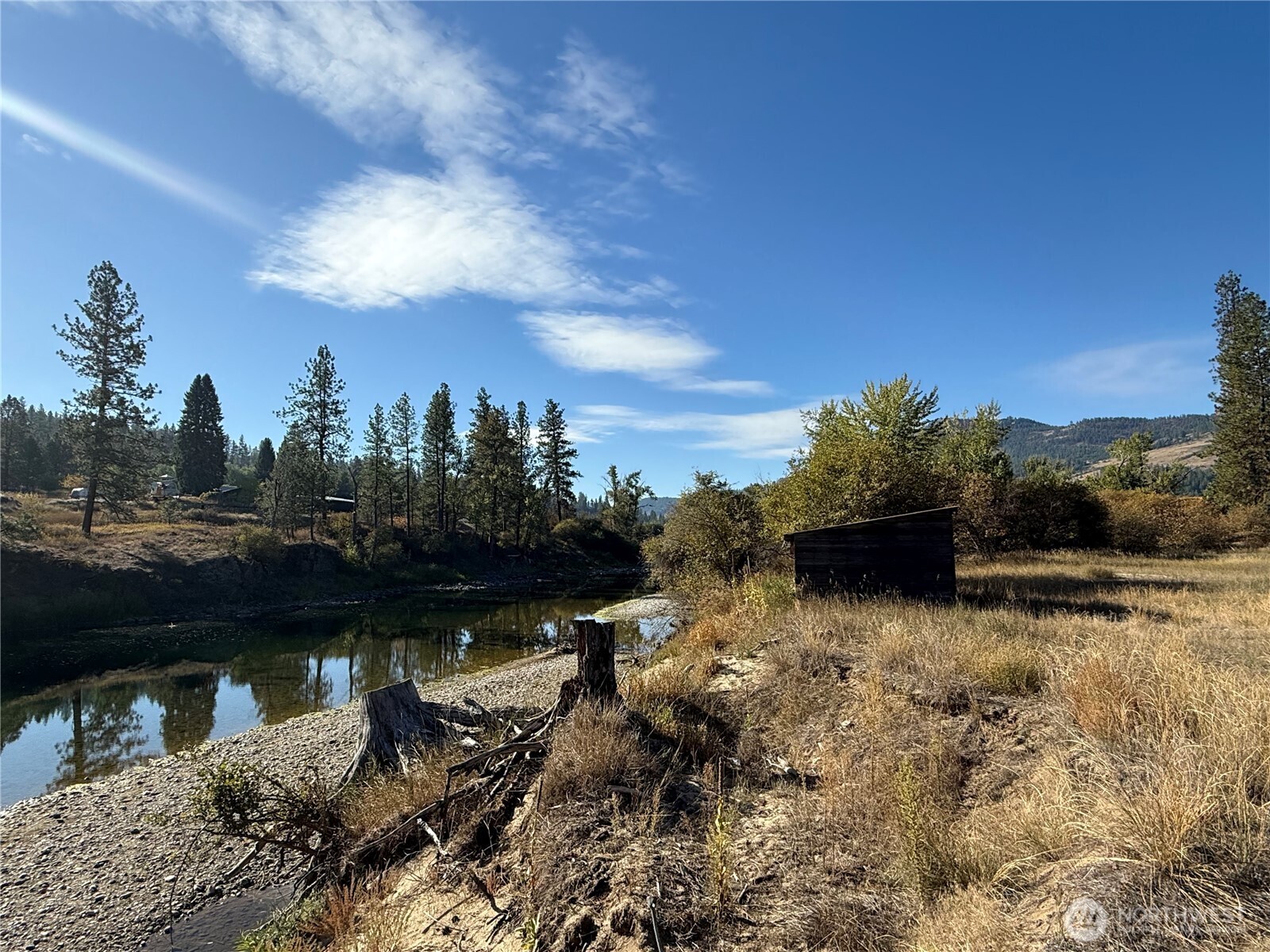 0 Tbd Highway Curlew, WA 99118 - Photo 1 of 19 a view of a lake with a yard