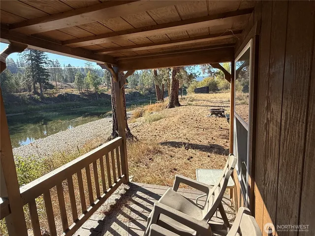 a view of a lake with a house in the background