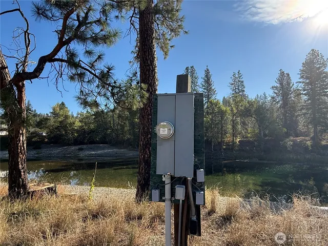 a view of a lake with a yard