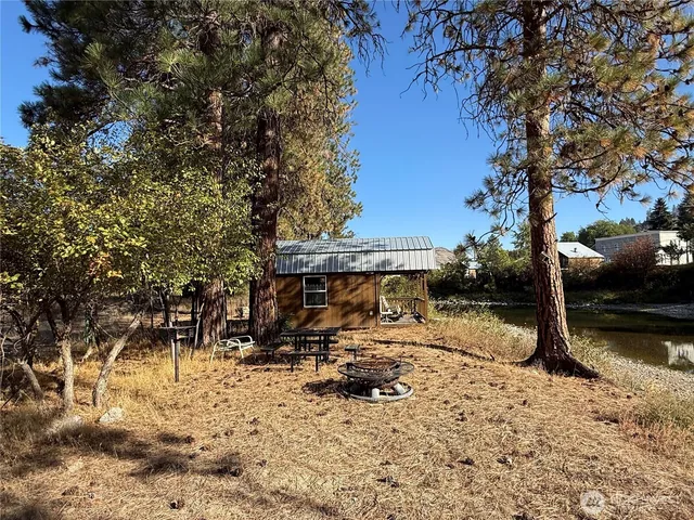 a view of a lake with a tree