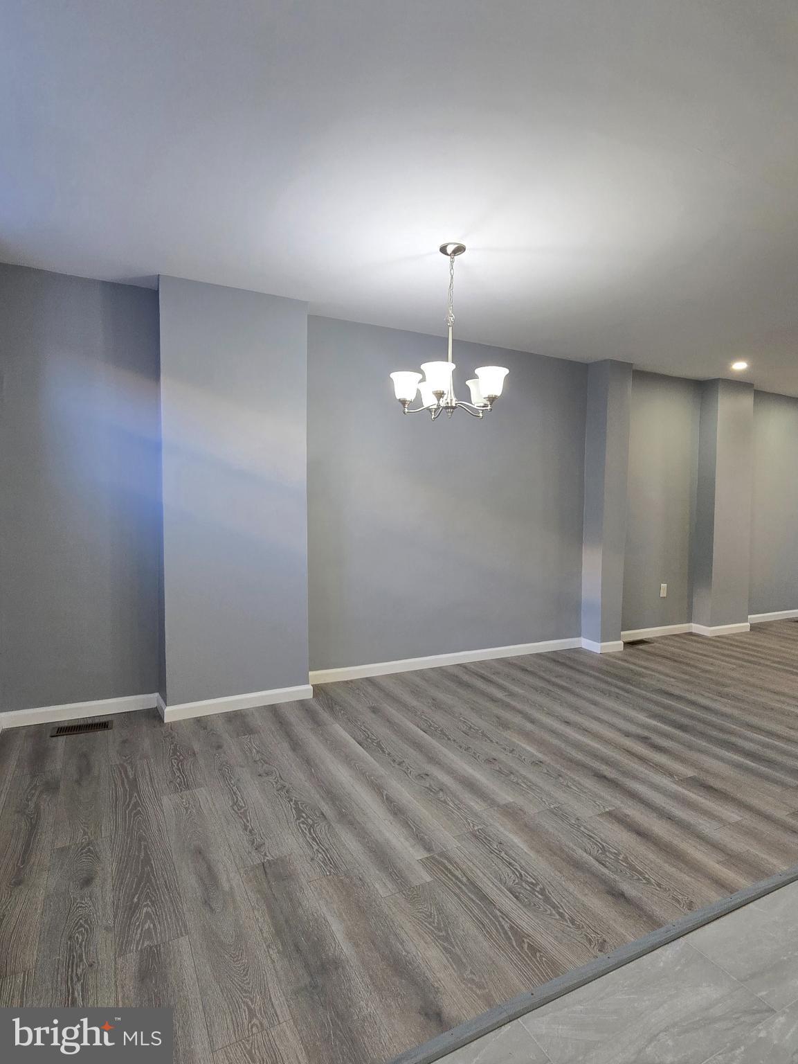 6733 Linmore Avenue Philadelphia, PA 19142 - Photo 17 of 55 Spacious, modern living area with elegance.