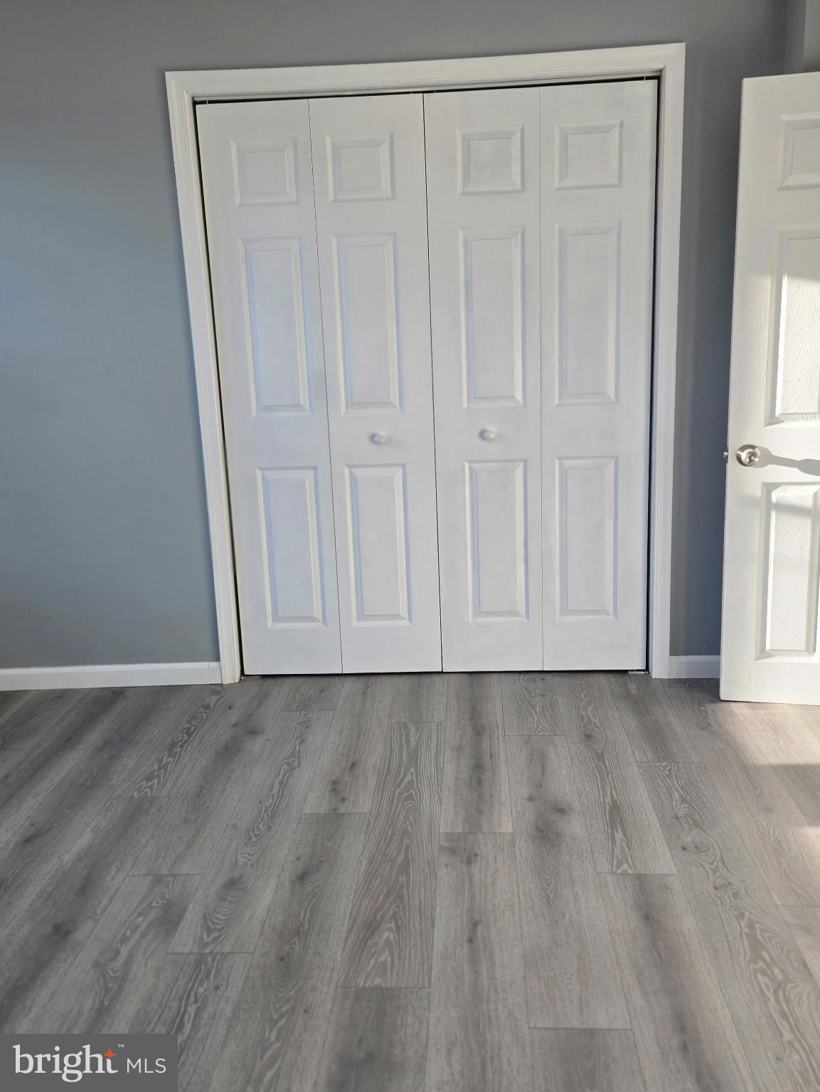 6733 Linmore Avenue Philadelphia, PA 19142 - Photo 26 of 55 Bright, airy space with sleek closet doors.