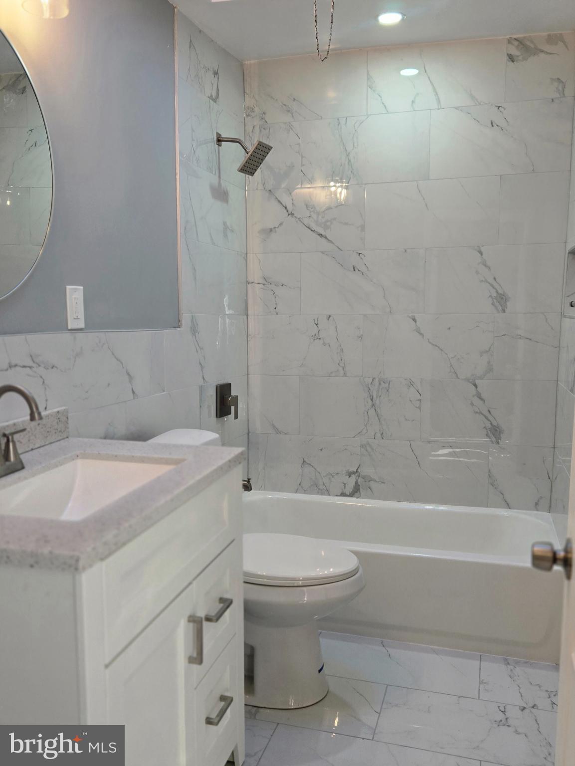 6733 Linmore Avenue Philadelphia, PA 19142 - Photo 27 of 55 a bathroom with a granite countertop sink toilet and shower