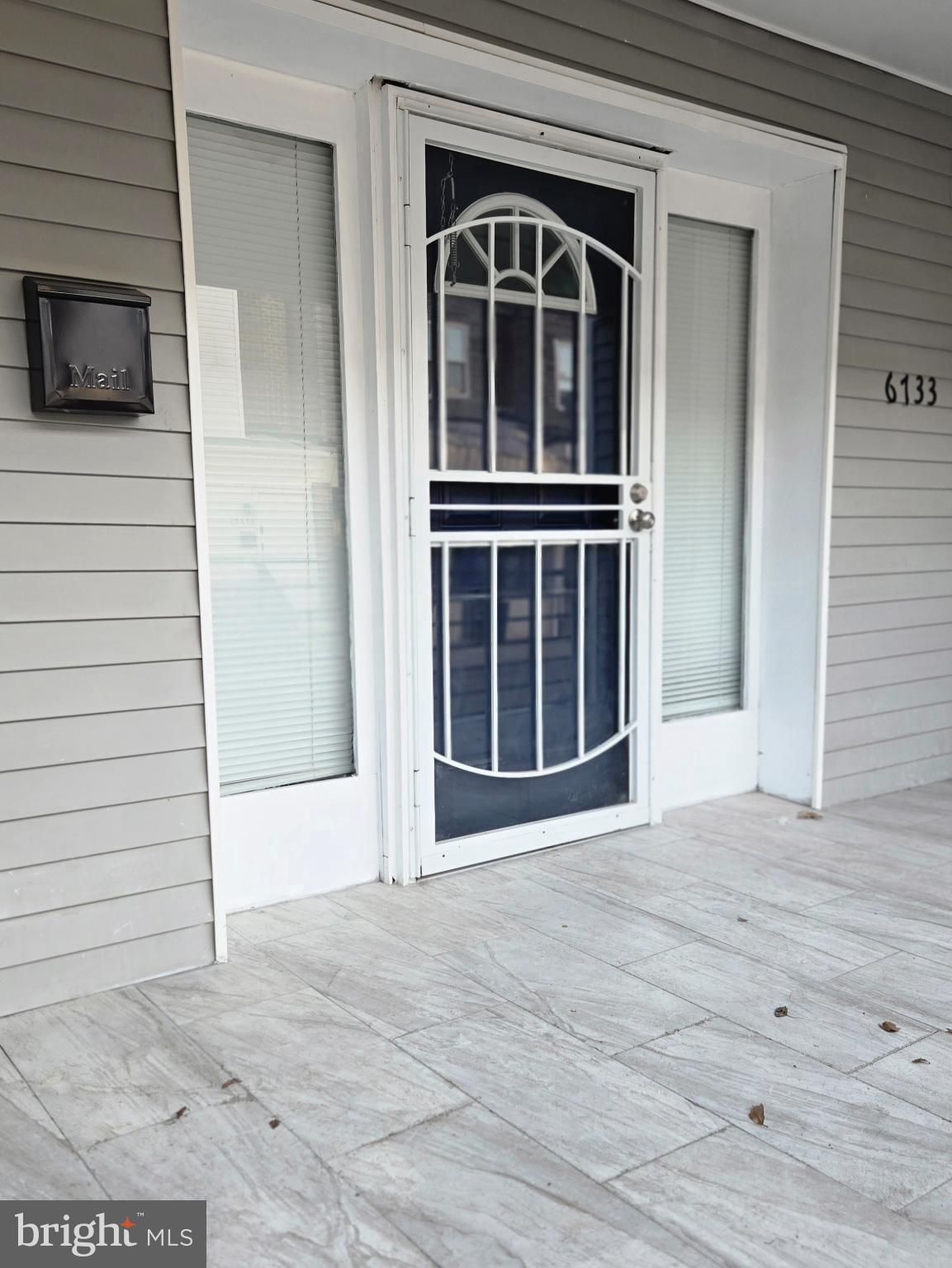 6733 Linmore Avenue Philadelphia, PA 19142 - Photo 3 of 55 a view of an entryway of house