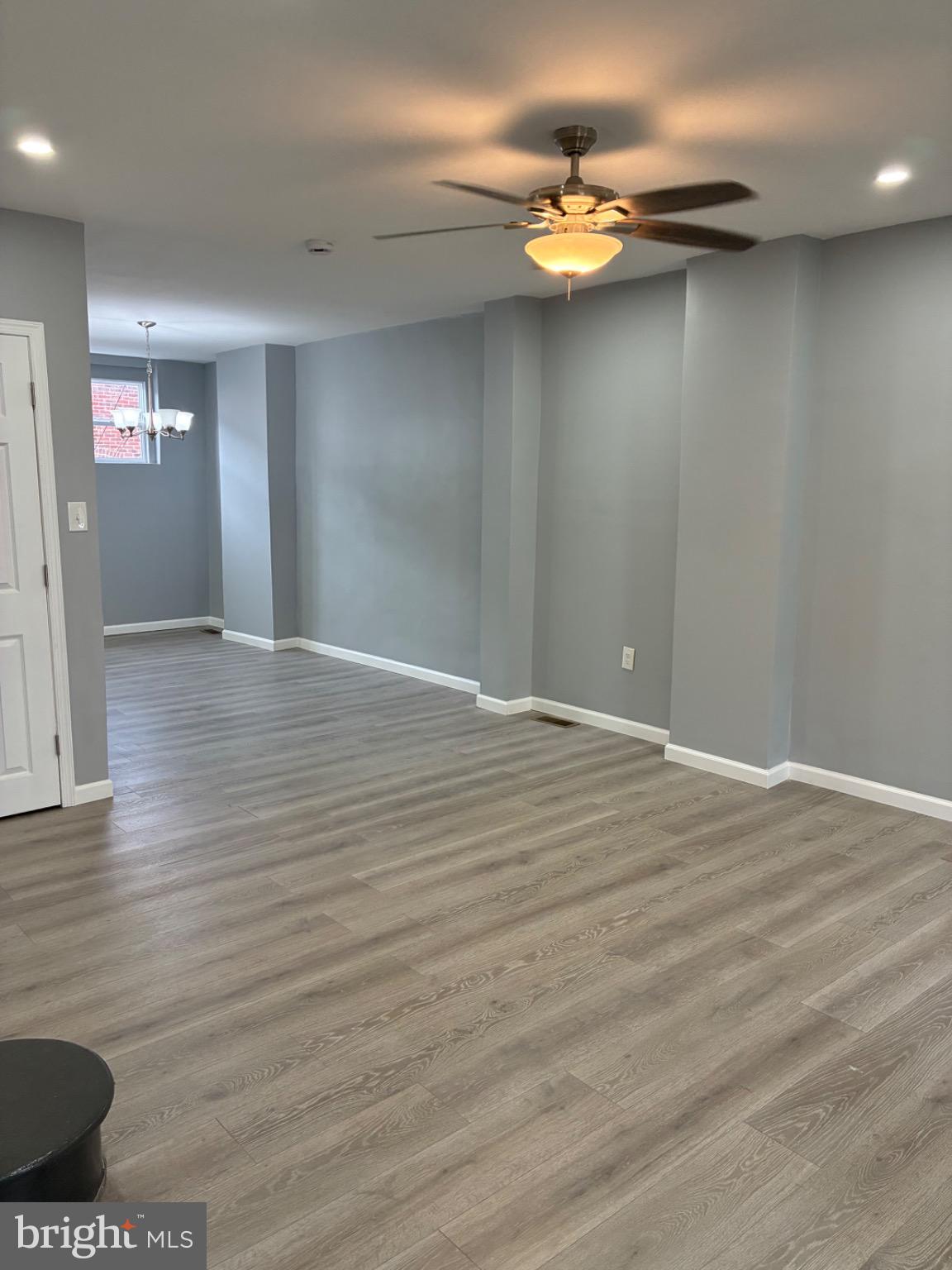6733 Linmore Avenue Philadelphia, PA 19142 - Photo 32 of 55 a view of an empty room with wooden floor