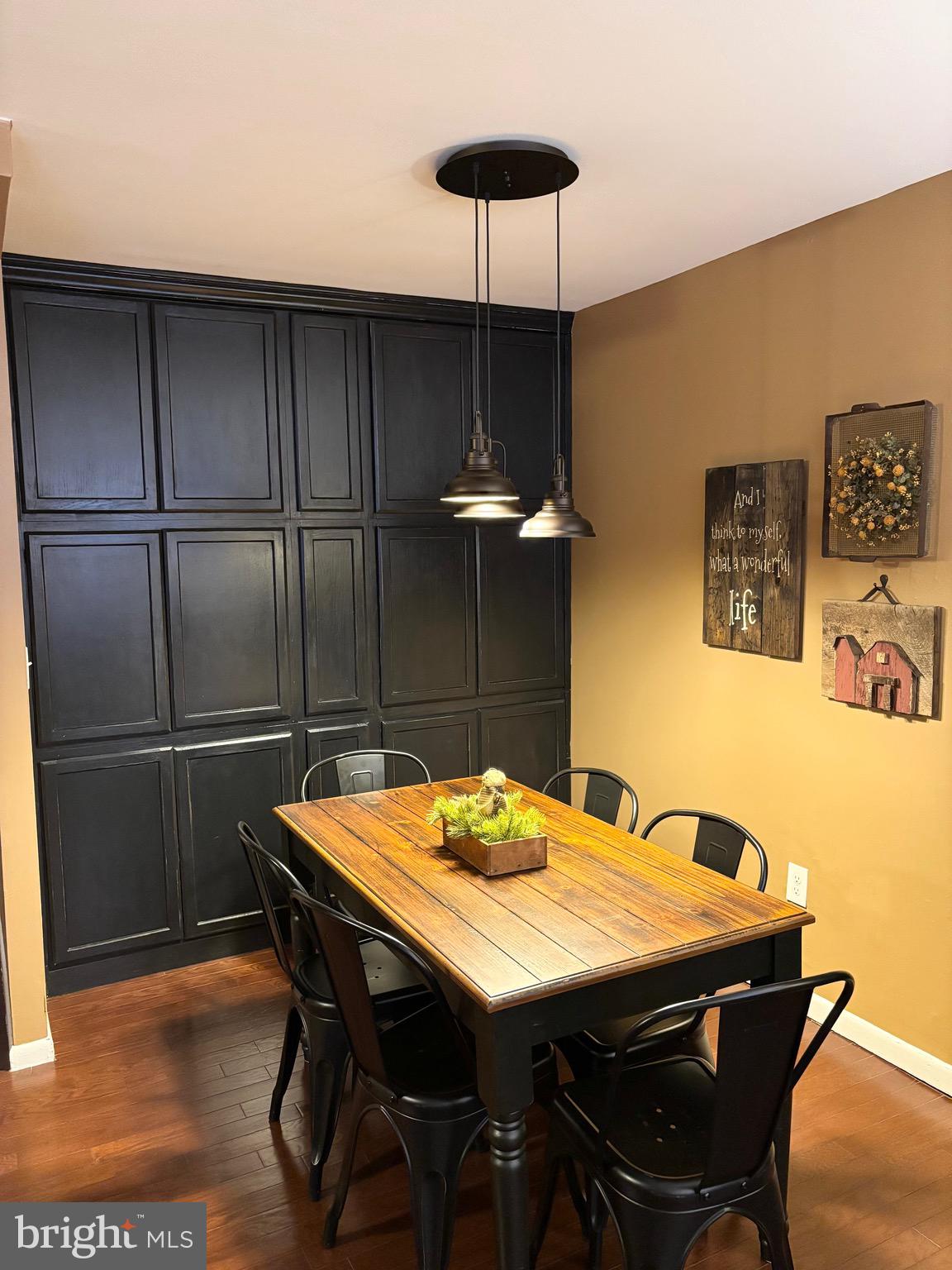 4701 Pennell Road, Unit F7 Aston, PA 19014 - Photo 9 of 13 a dining room with furniture and wooden floor