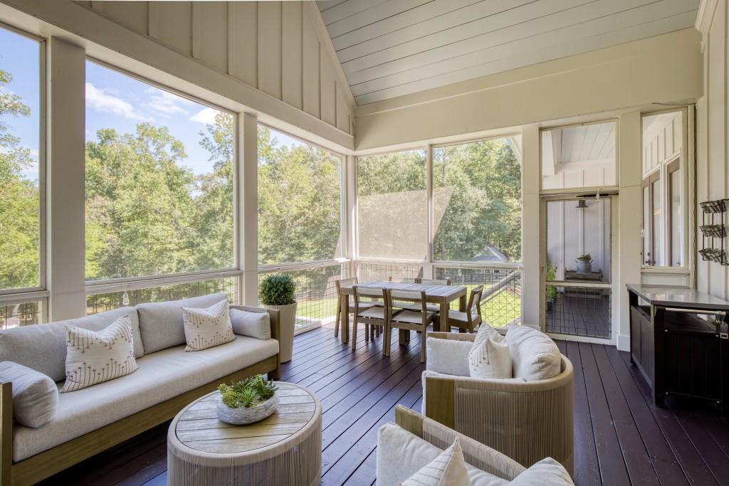13235 Arnold Mill Road Roswell, GA 30075 - Photo 50 of 72 a living room with furniture and a large window