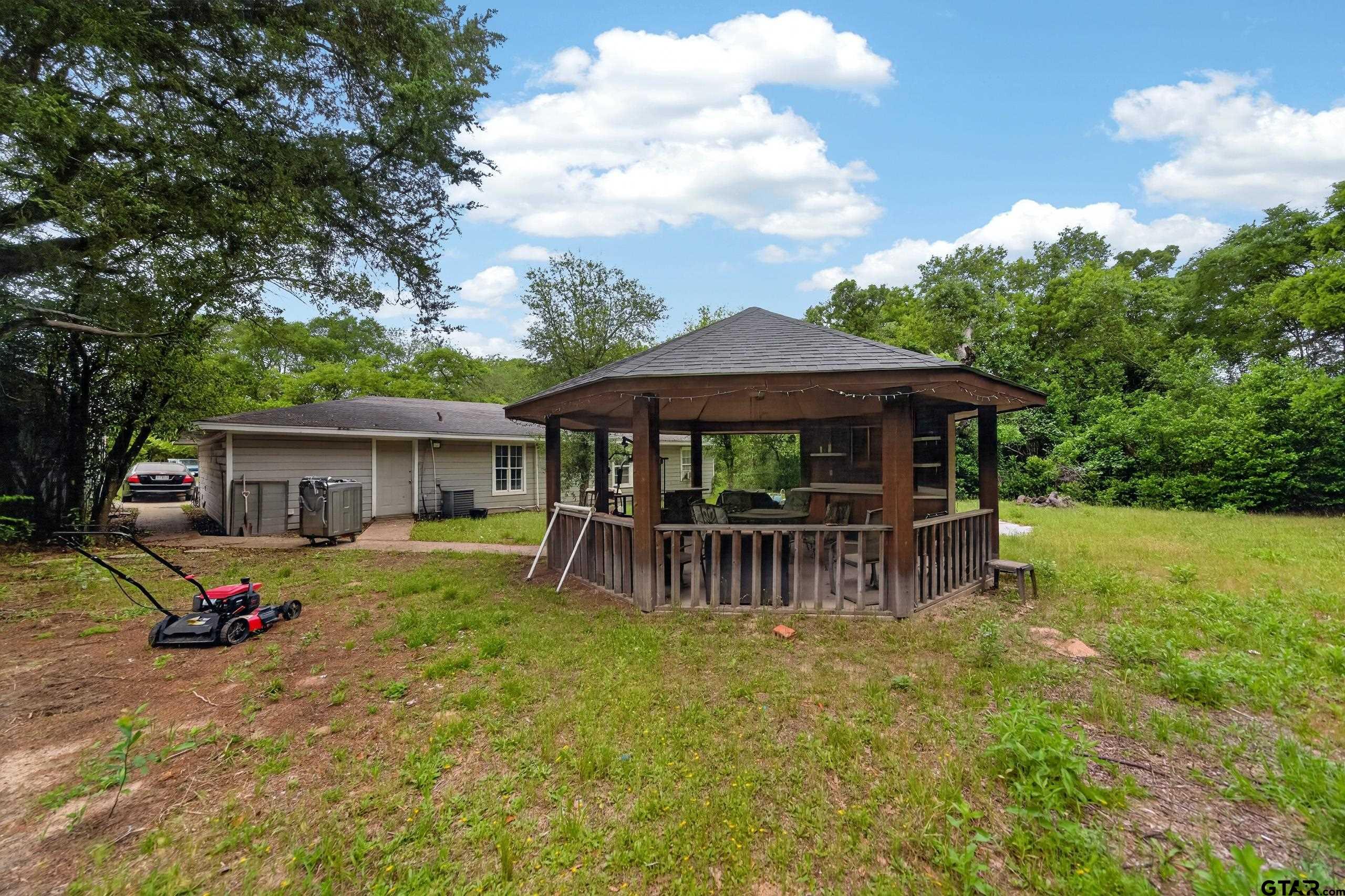 319 McArthur Street Athens, TX 75751 - Photo 32 of 33 a front view of a house with garden