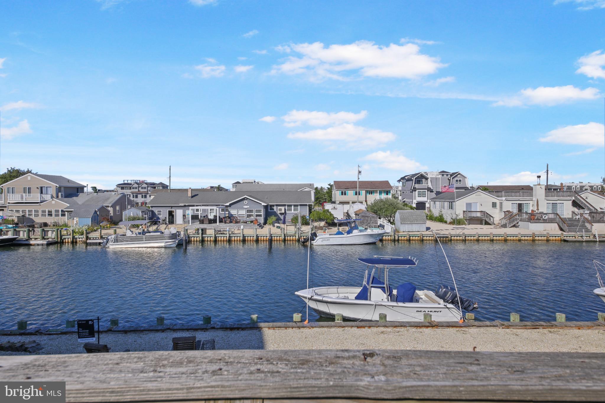 33 Adrian Road Long Beach Township, NJ 08006 - Photo 5 of 31 a view of a lake with a city