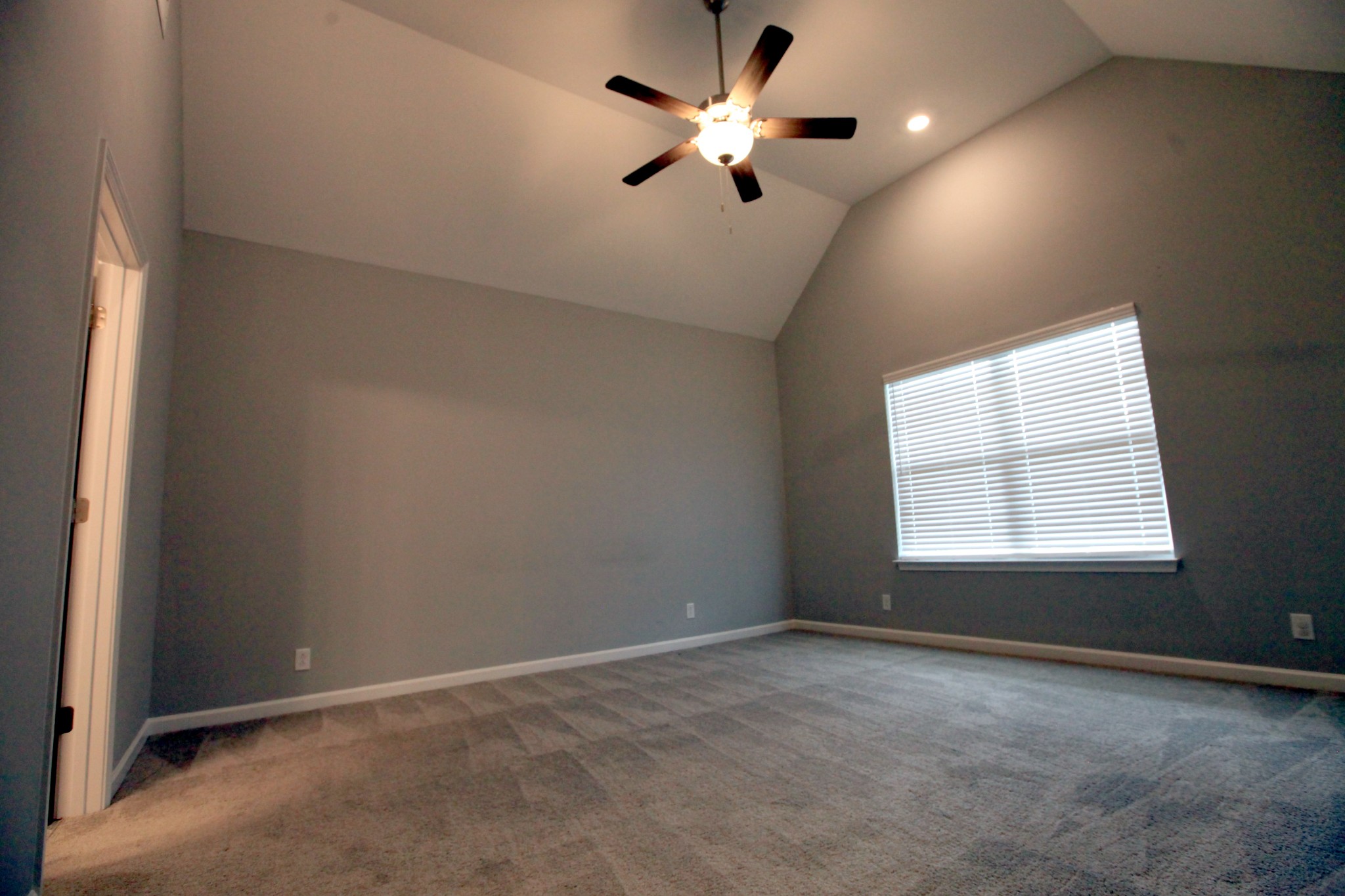 3718 Black Powder Lane Rockvale, TN 37153 - Photo 11 of 31 an empty room with a window and a fan
