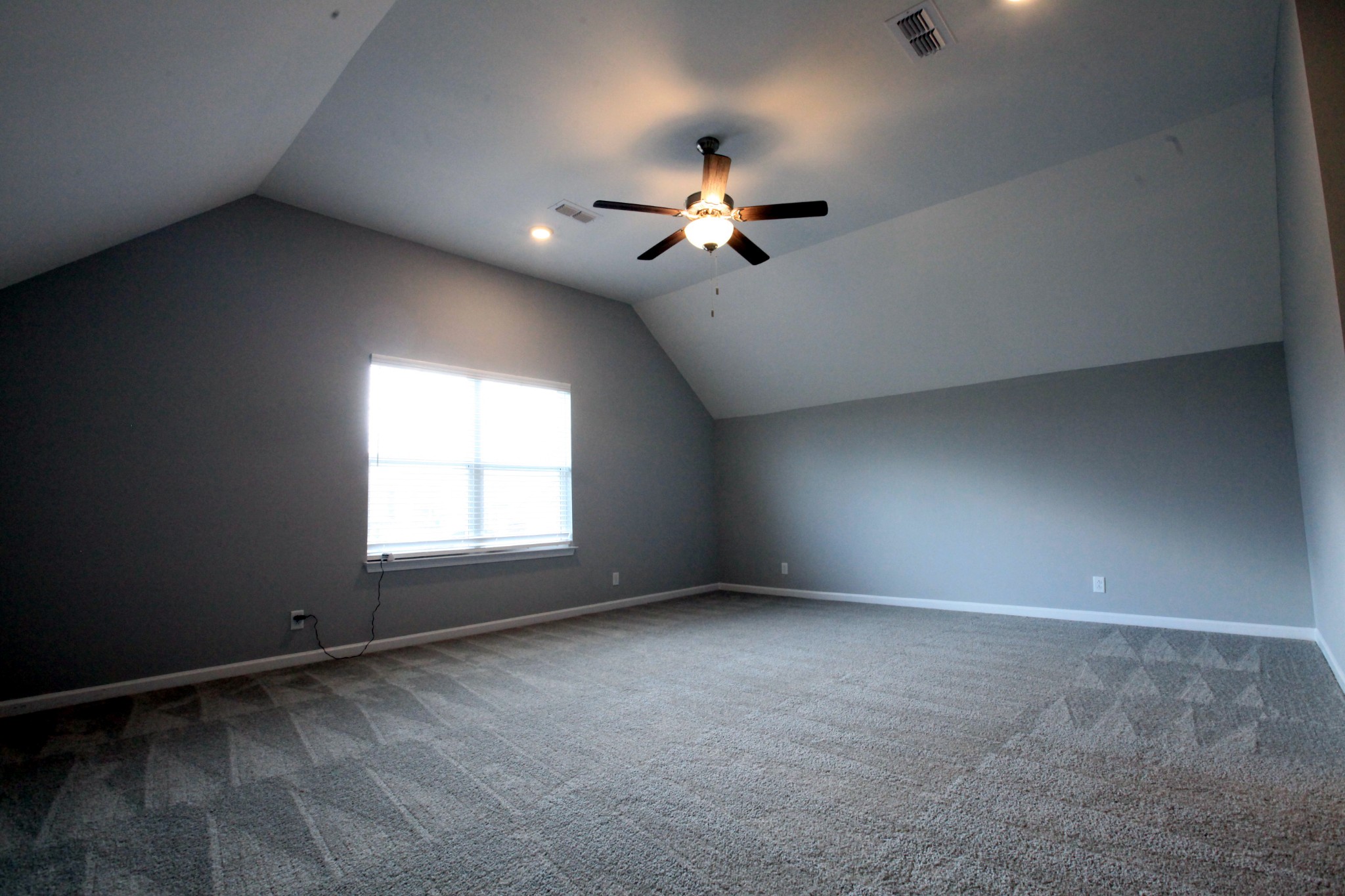 3718 Black Powder Lane Rockvale, TN 37153 - Photo 21 of 31 an empty room with a window and a fan