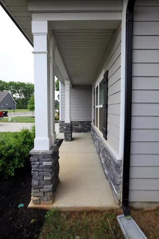 a view of an entryway with garden