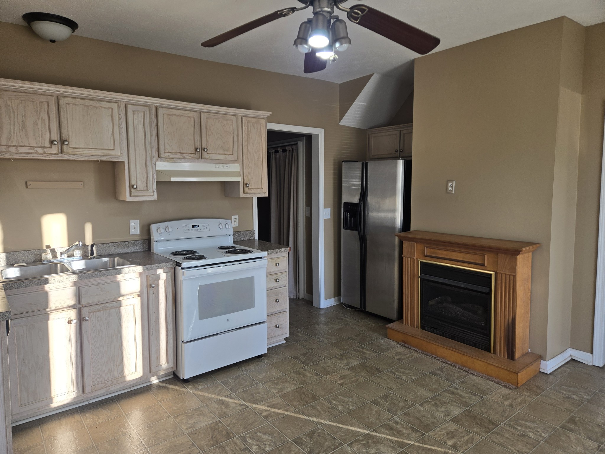 3769 Calista Road Cross Plains, TN 37049 - Photo 2 of 8 a kitchen with a stove and refrigerator