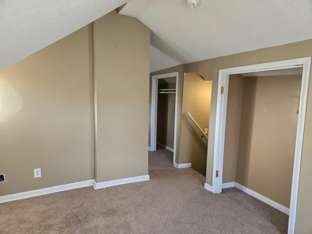 an empty room with closet