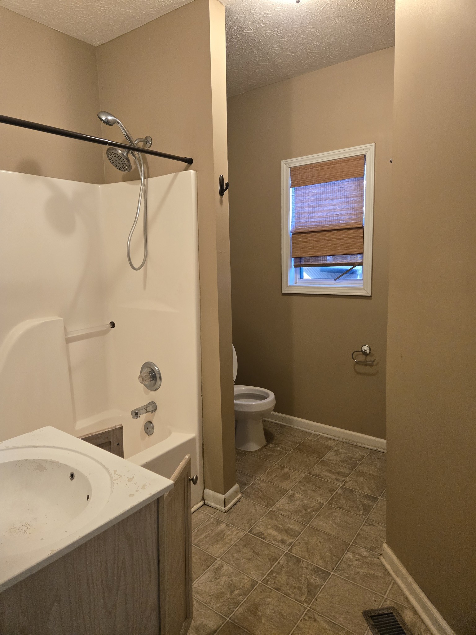 3769 Calista Road Cross Plains, TN 37049 - Photo 6 of 8 a bathroom with a sink a toilet and shower