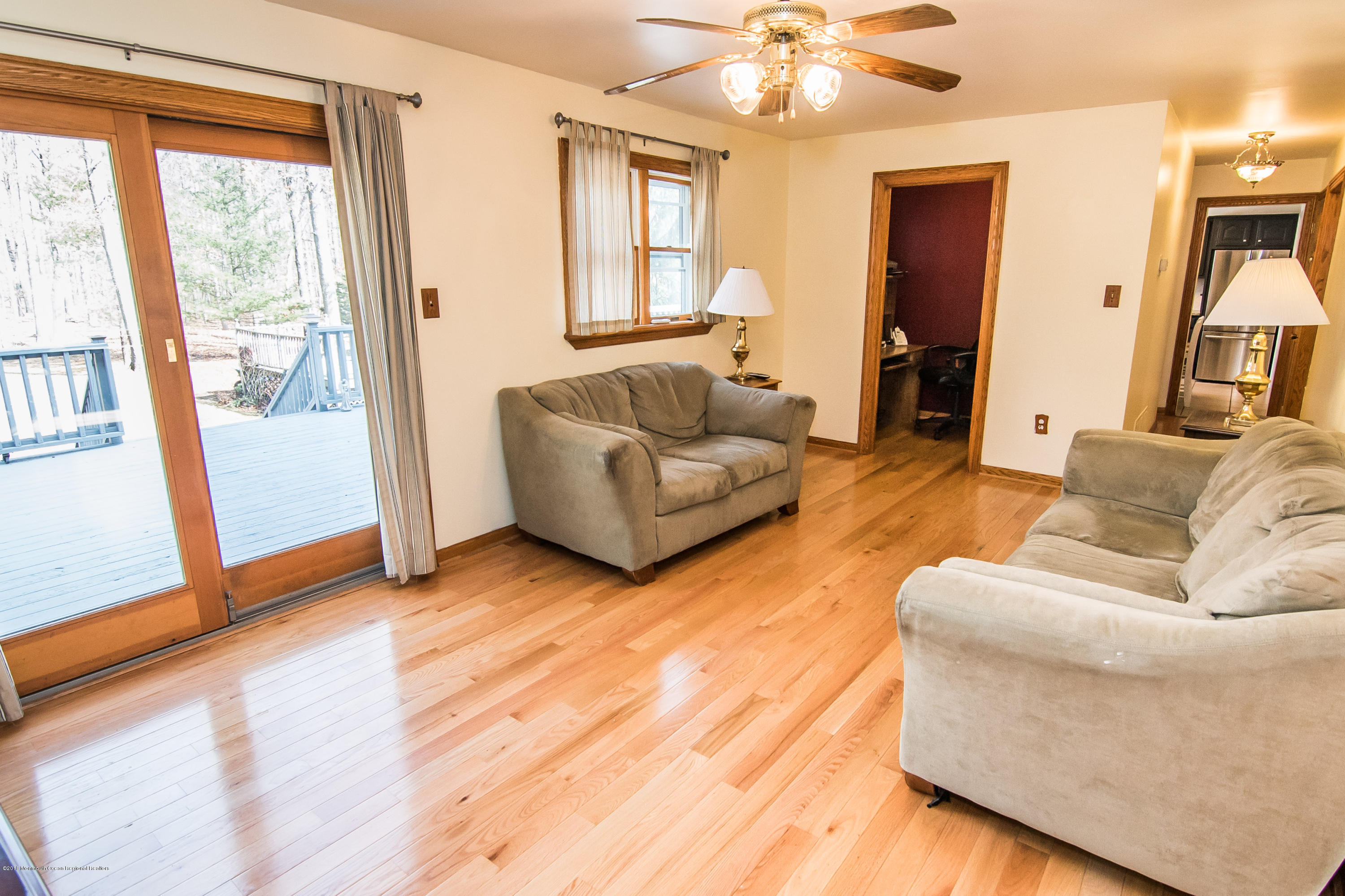 413 Leesville Road Jackson, NJ 08527 - Photo 9 of 24 413 Leesville family room to sliders