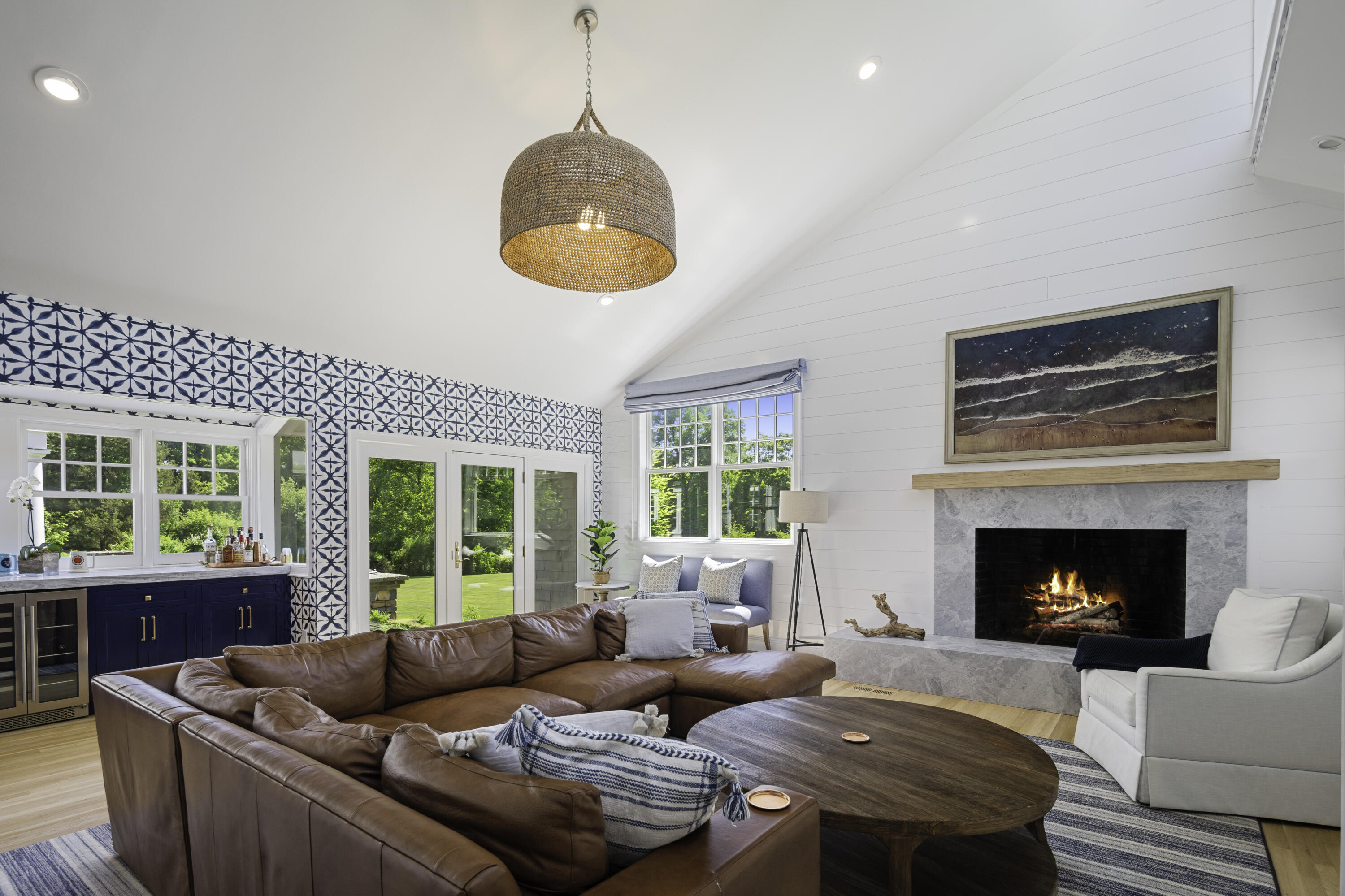 31 Bayberry Road New Canaan, CT 06840 - Photo 21 of 47 a living room with furniture and a fireplace