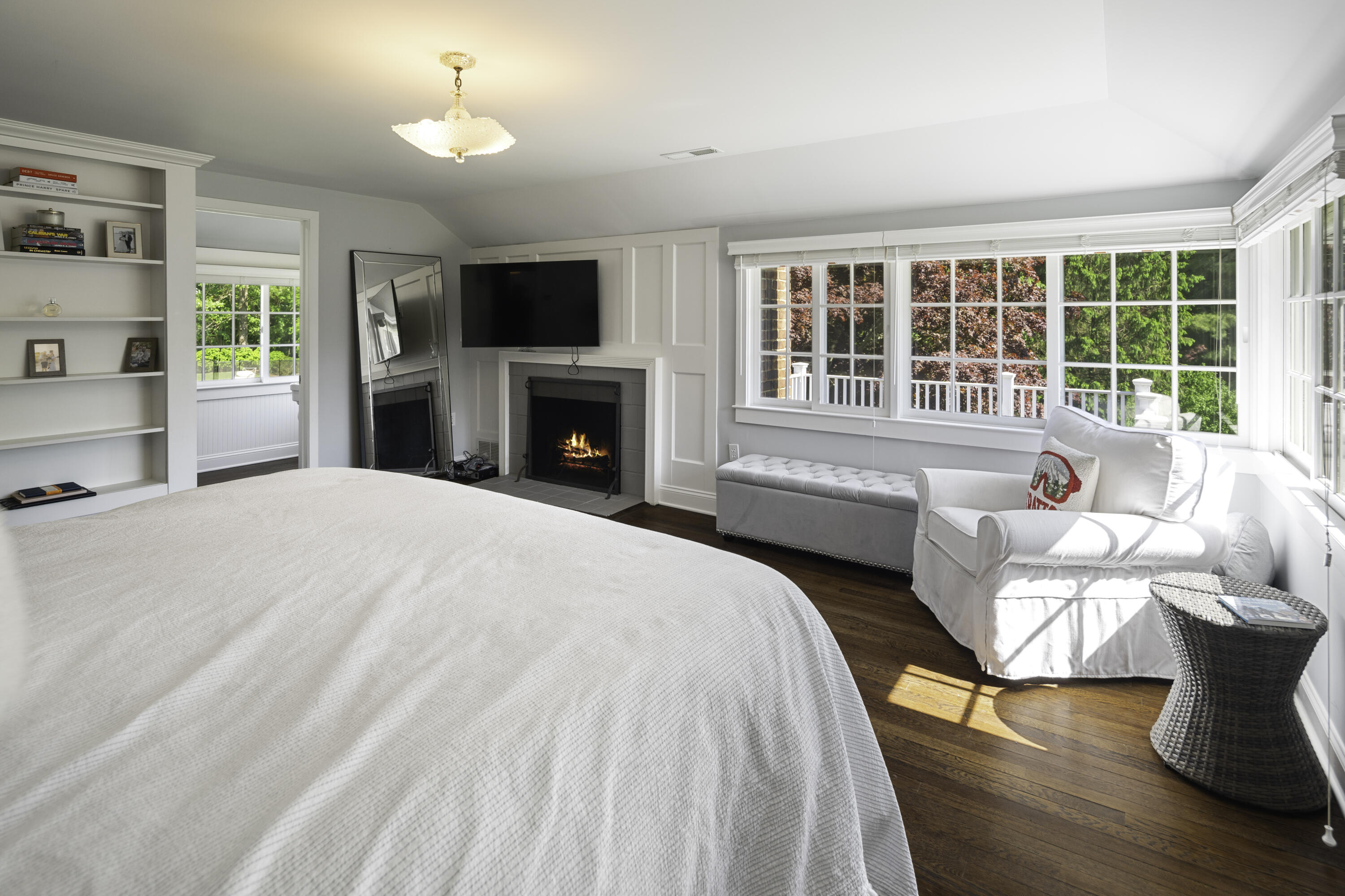 31 Bayberry Road New Canaan, CT 06840 - Photo 32 of 47 a spacious bedroom with a bed and a couch