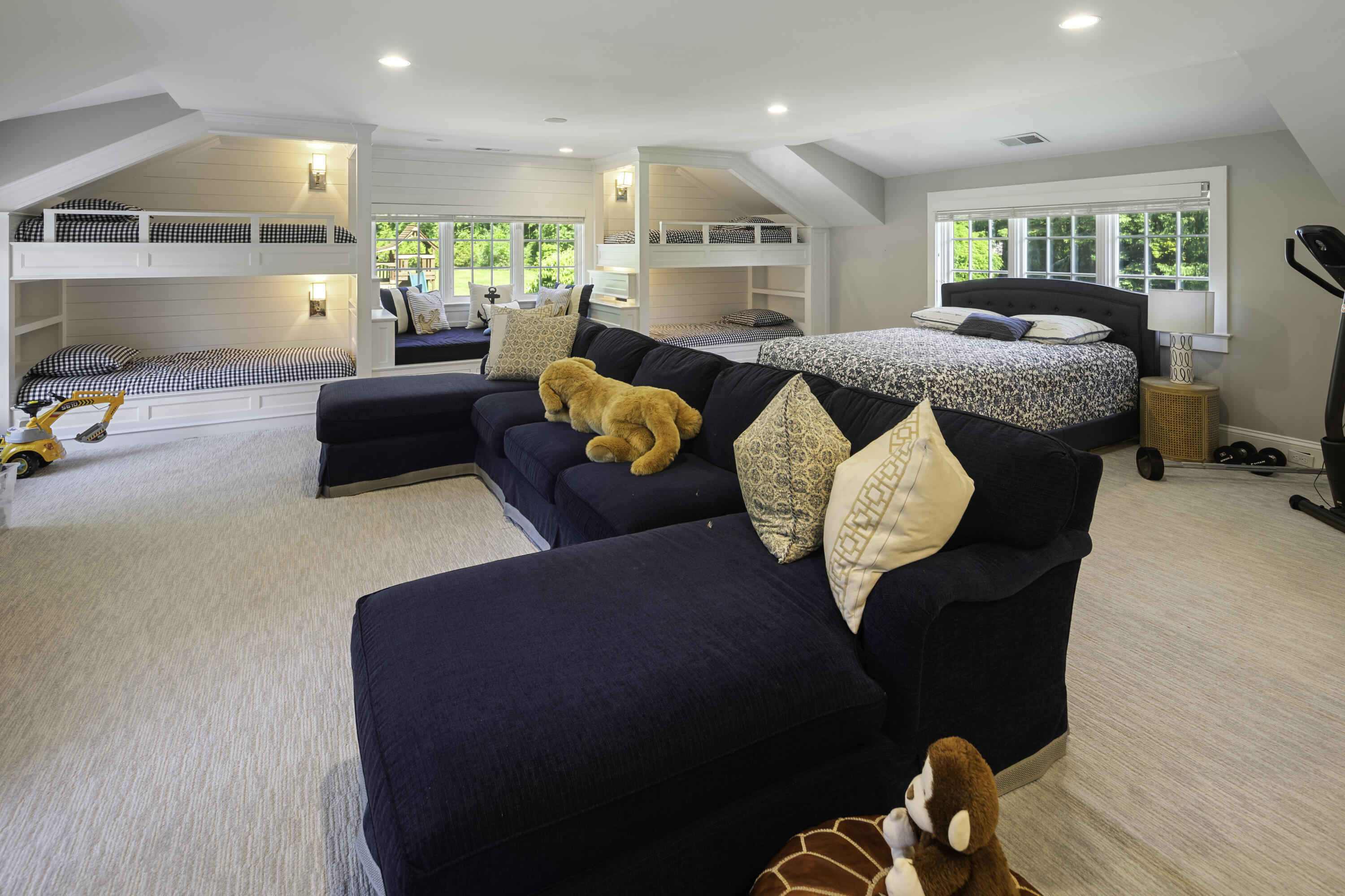 31 Bayberry Road New Canaan, CT 06840 - Photo 35 of 47 a living room with furniture fireplace and a large window