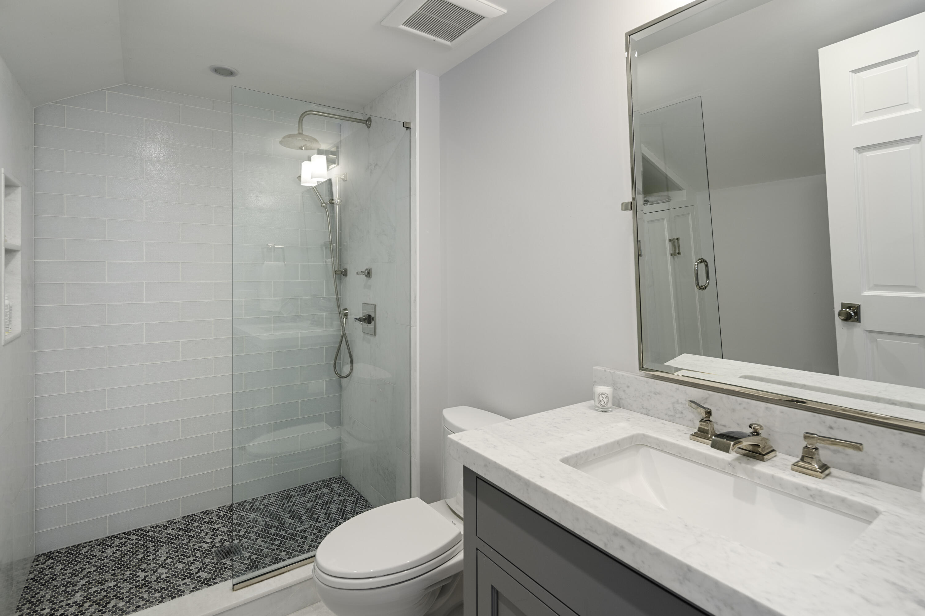 31 Bayberry Road New Canaan, CT 06840 - Photo 37 of 47 a bathroom with a sink toilet vanity and shower