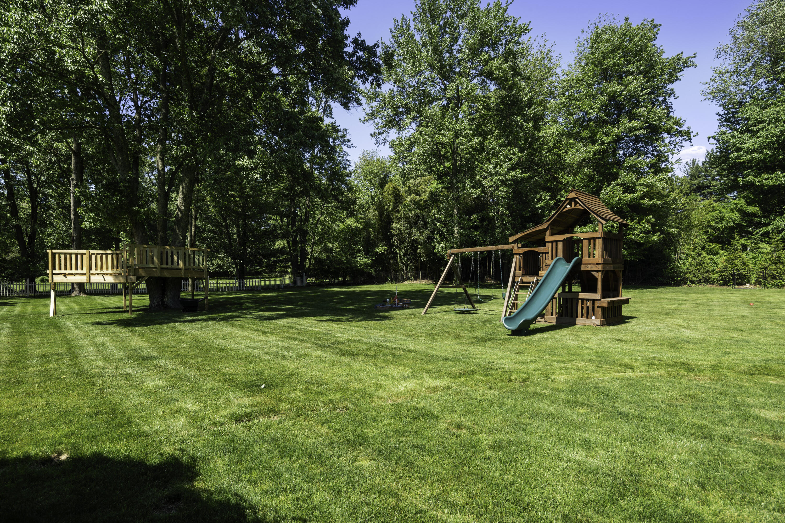 31 Bayberry Road New Canaan, CT 06840 - Photo 42 of 47 a view of a park with slide