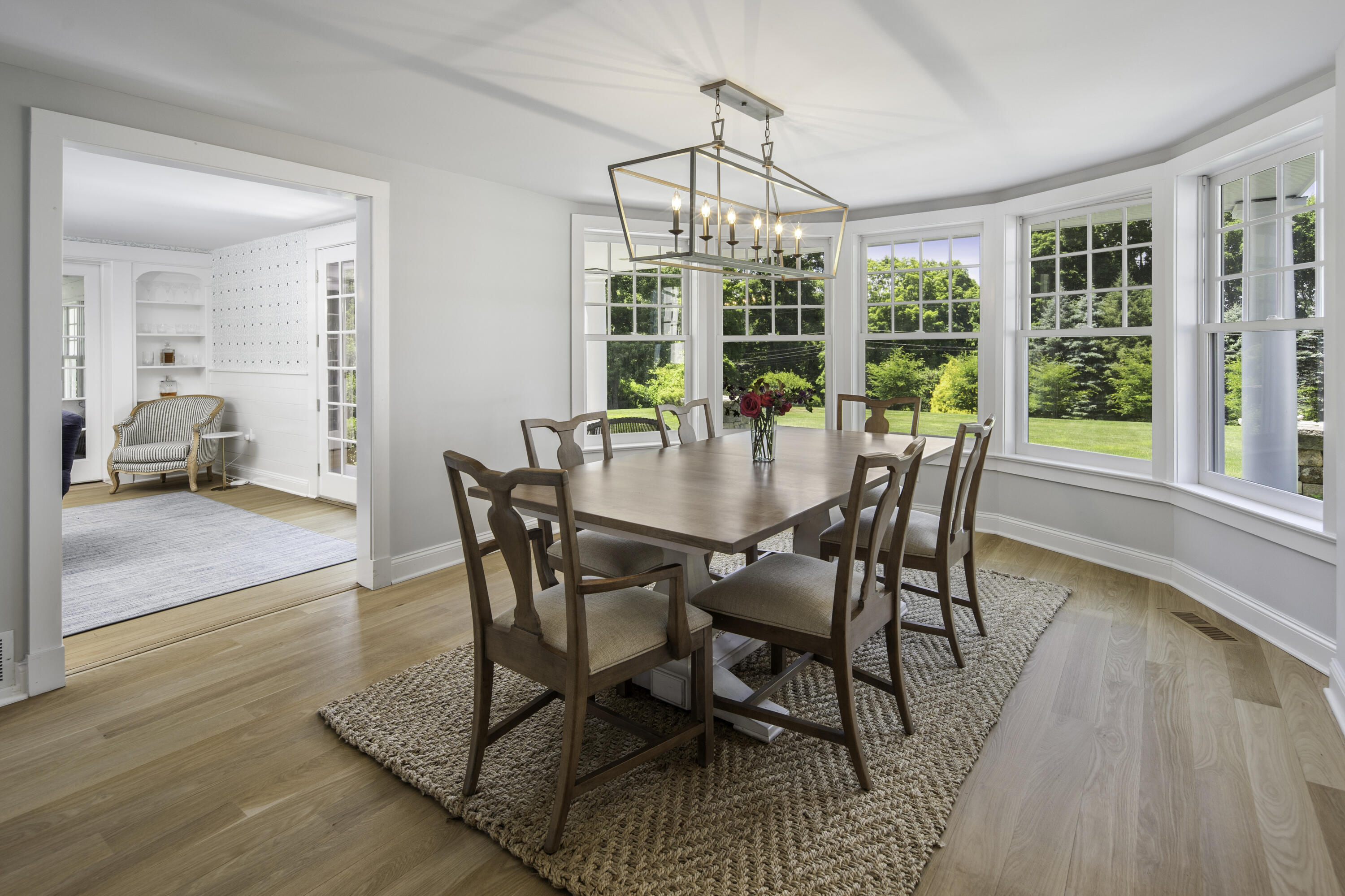 31 Bayberry Road New Canaan, CT 06840 - Photo 9 of 47 a view of a dining room with furniture window and wooden floor