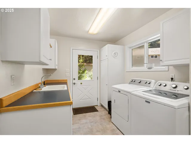 a living room with a couch and a window