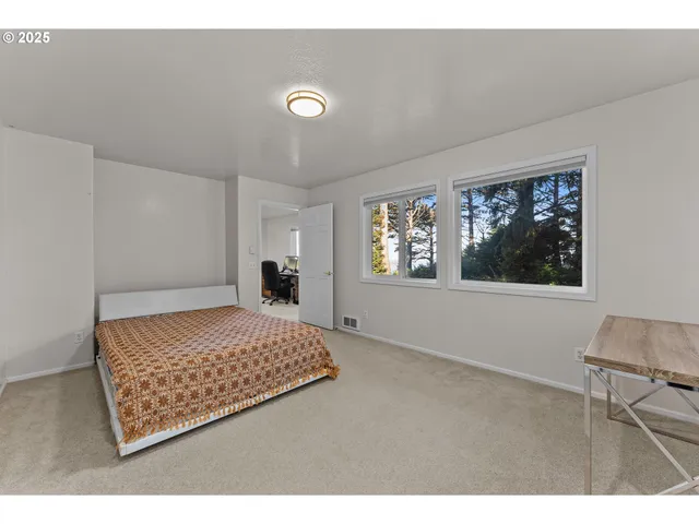 a bathroom with a sink toilet a mirror and shower