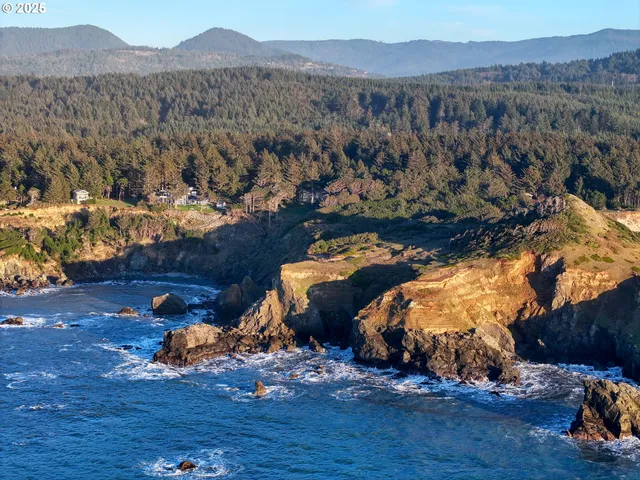 a view of water with a mountain