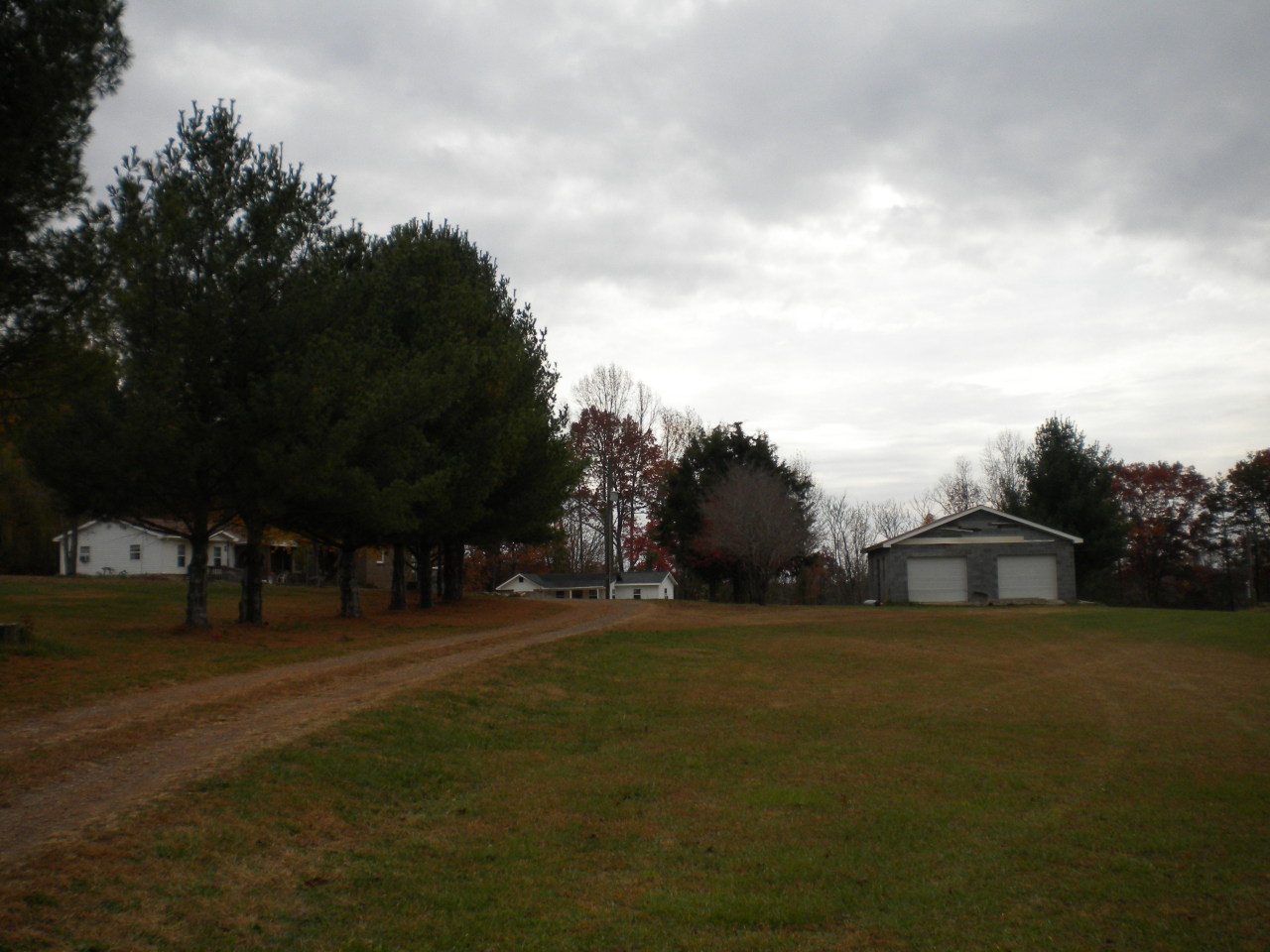 2284 Virginia Nc Road Spencer, VA 24165 - Photo 3 of 9 a front view of a house with a garden