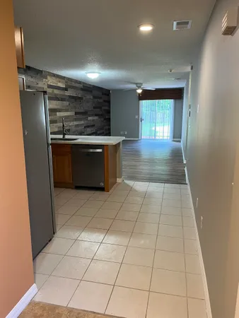 a view of kitchen with a sink
