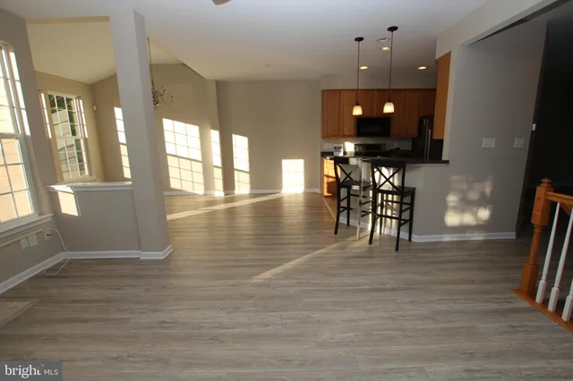 a view of a living room and dining room