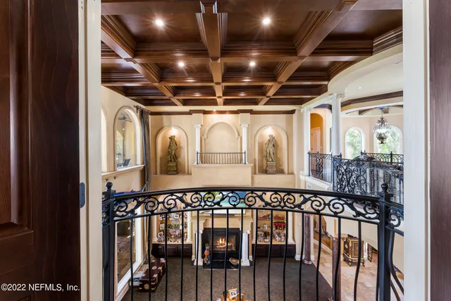 a kitchen with a sink a stove cabinets and a counter top space