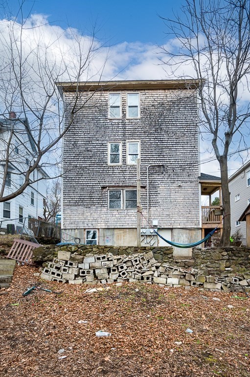 256 Belmont Street Worcester, MA 01604 - Photo 6 of 40 a brick building with a bench in front of it