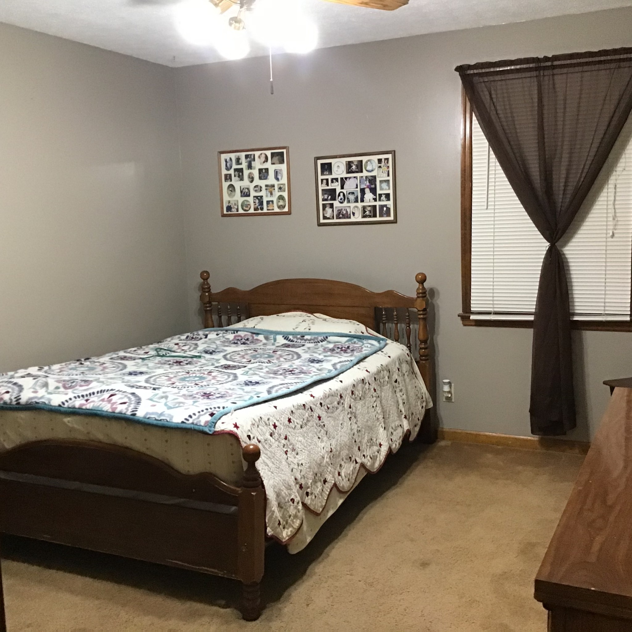 6830 Hester Road Springfield, TN 37172 - Photo 18 of 28 a bedroom with a bed next to a window