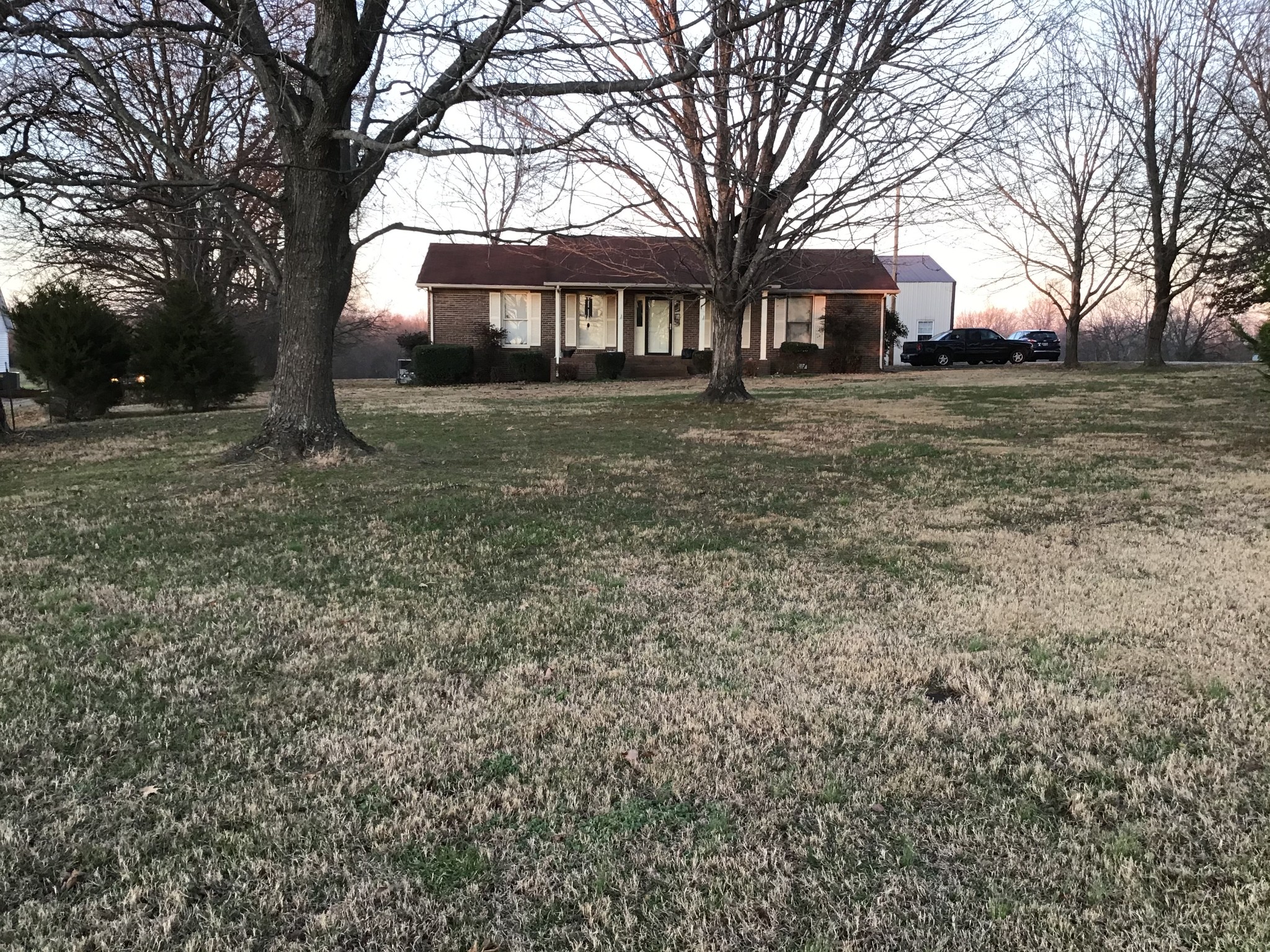 6830 Hester Road Springfield, TN 37172 - Photo 5 of 28 a front view of a house with a yard