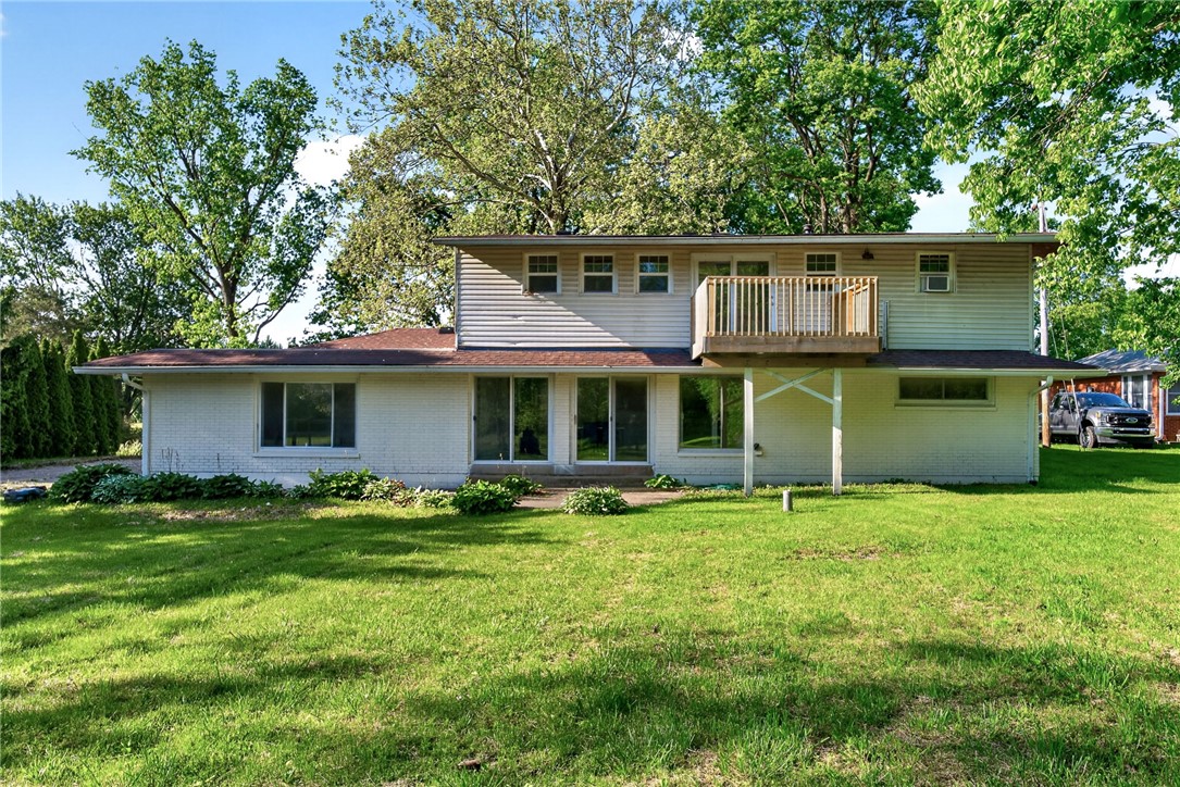 2684 Arthur Road Springfield, OH 45502 - Photo 52 of 69 This home features a lush yard and an inviting outdoor living space.