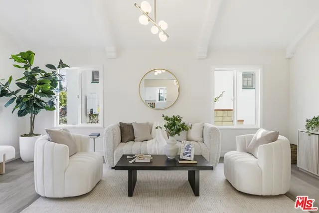 a kitchen with cabinets and appliances