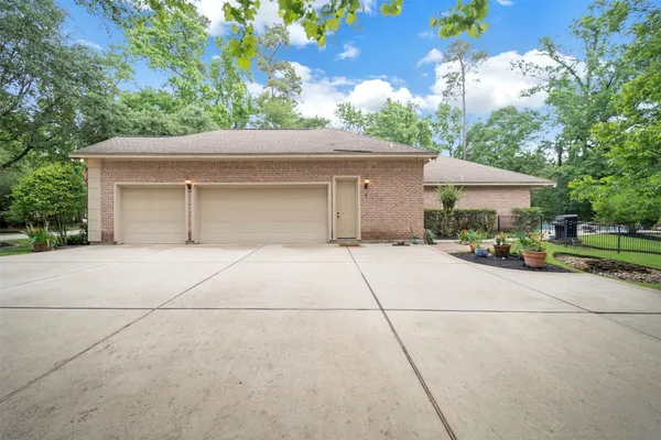 $880,000 | 3 Quinn's Cabin Court, Conroe, TX 77304