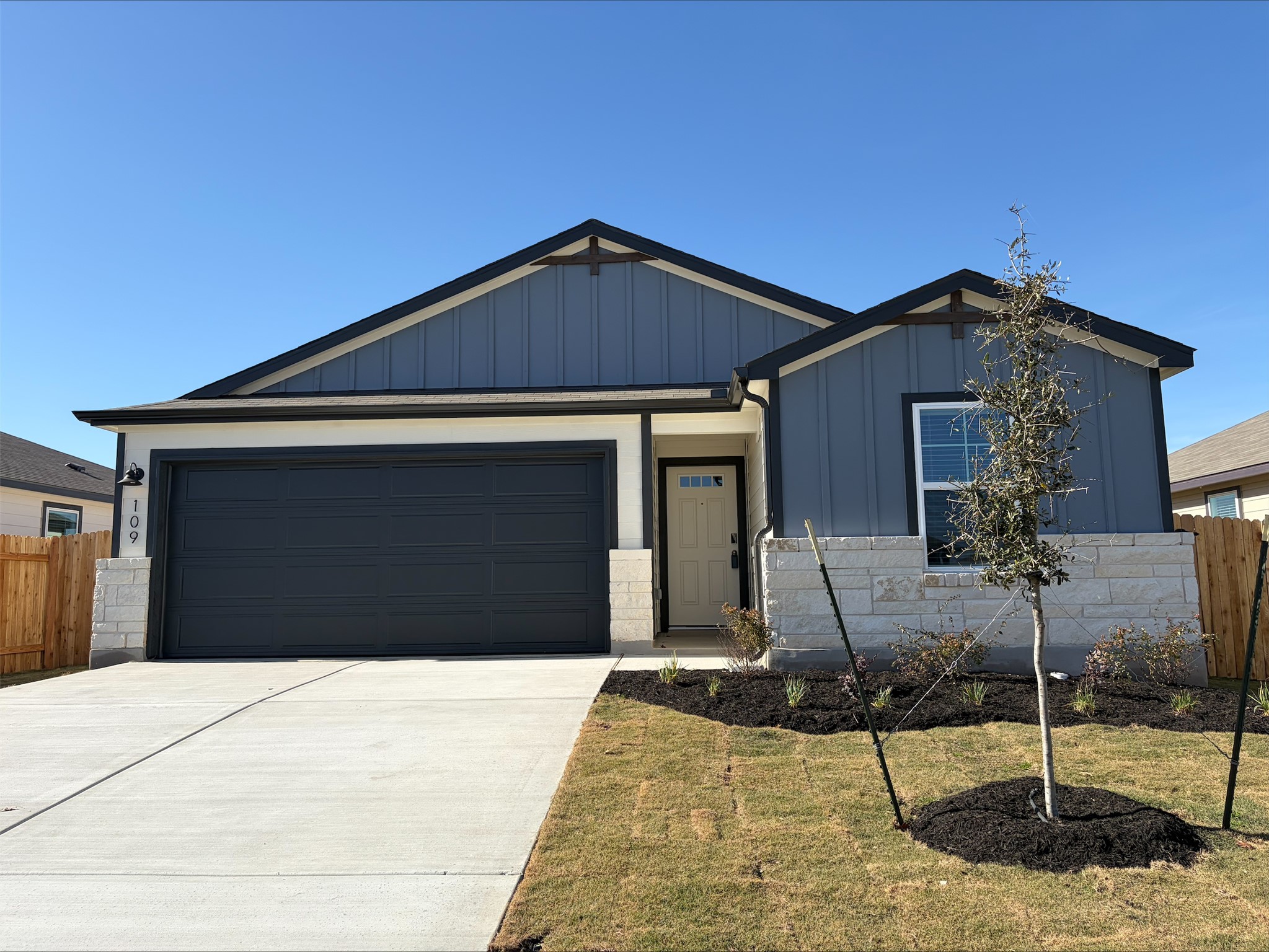 109 Honey Bee Road Jarrell, TX 76537 - Photo 2 of 10 a front view of a house with entertaining space
