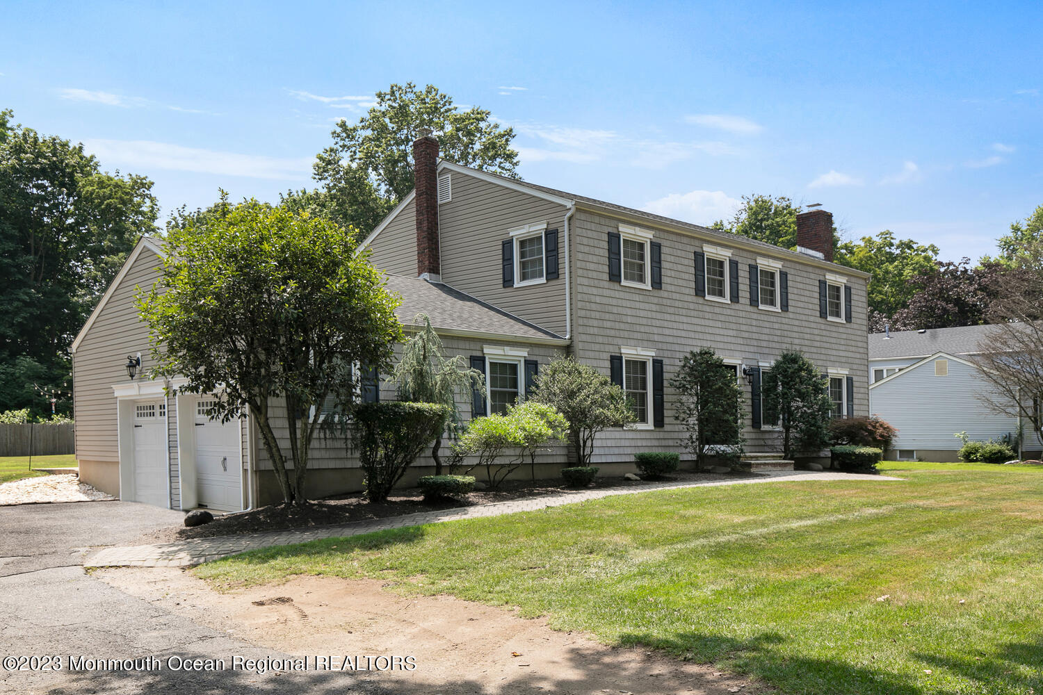 383 Oak Hill Road Red Bank, NJ 07701 - Photo 3 of 31 a front view of house with yard