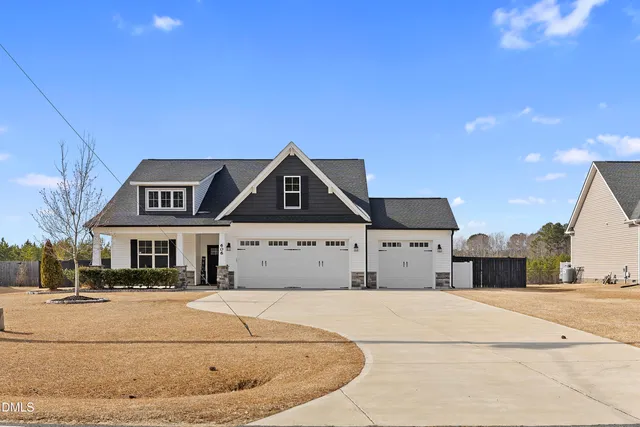 a bathroom with a sink vanity and a mirror