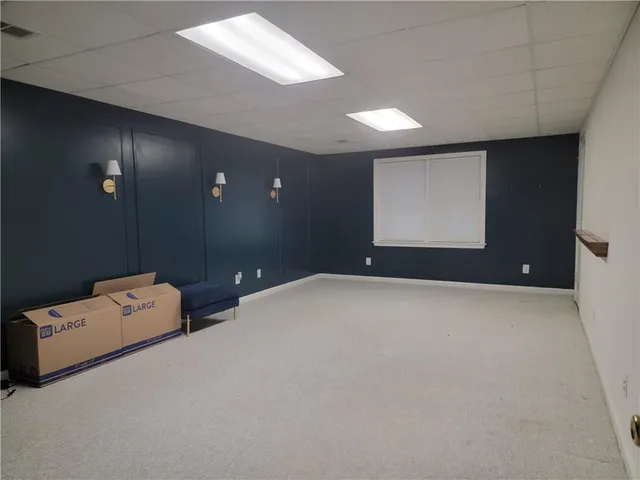 a workspace with a ceiling fan