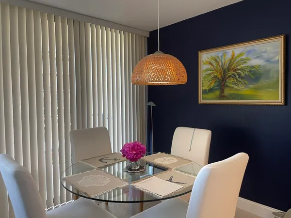 a view of a dining room with furniture