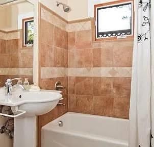 a bathroom with a sink and a bathtub