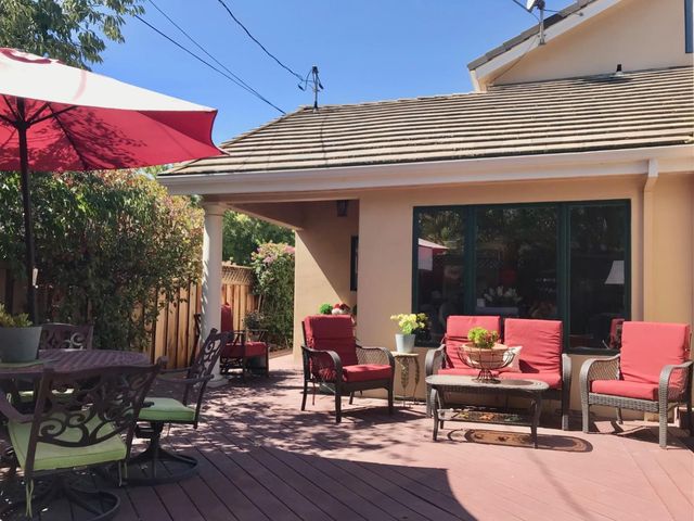 a building outdoor space with patio furniture