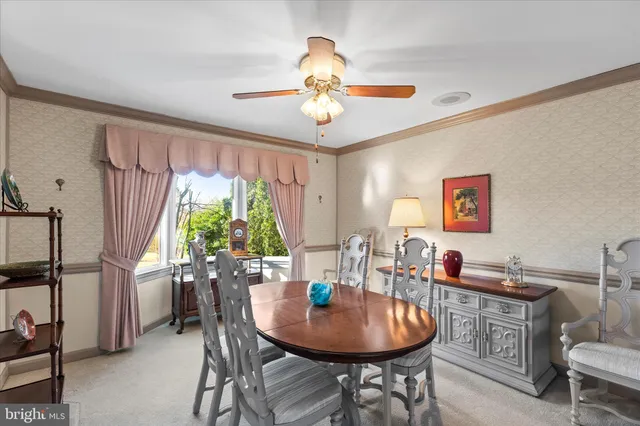 a kitchen with a stove a sink and a refrigerator